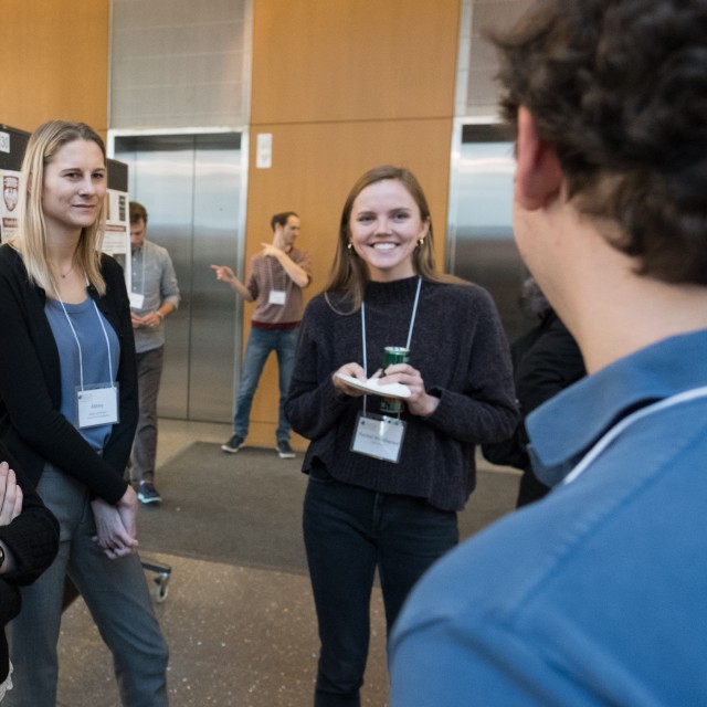 Rachel Weathered and Abby Lauterbach at a poster session